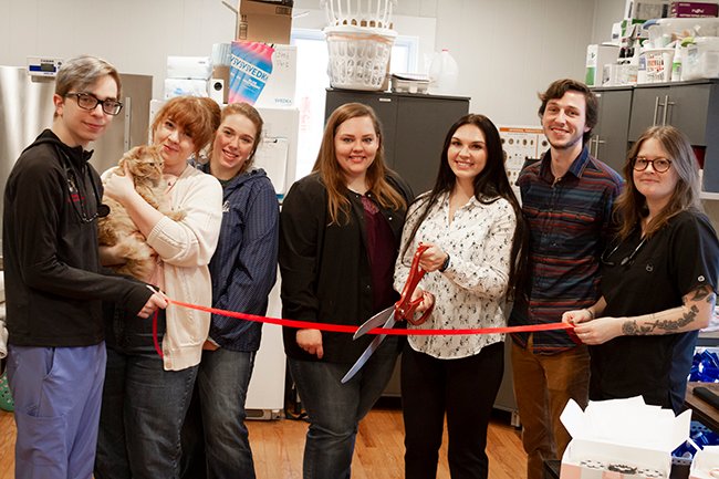 Five Rivers team at a ribbon cutting